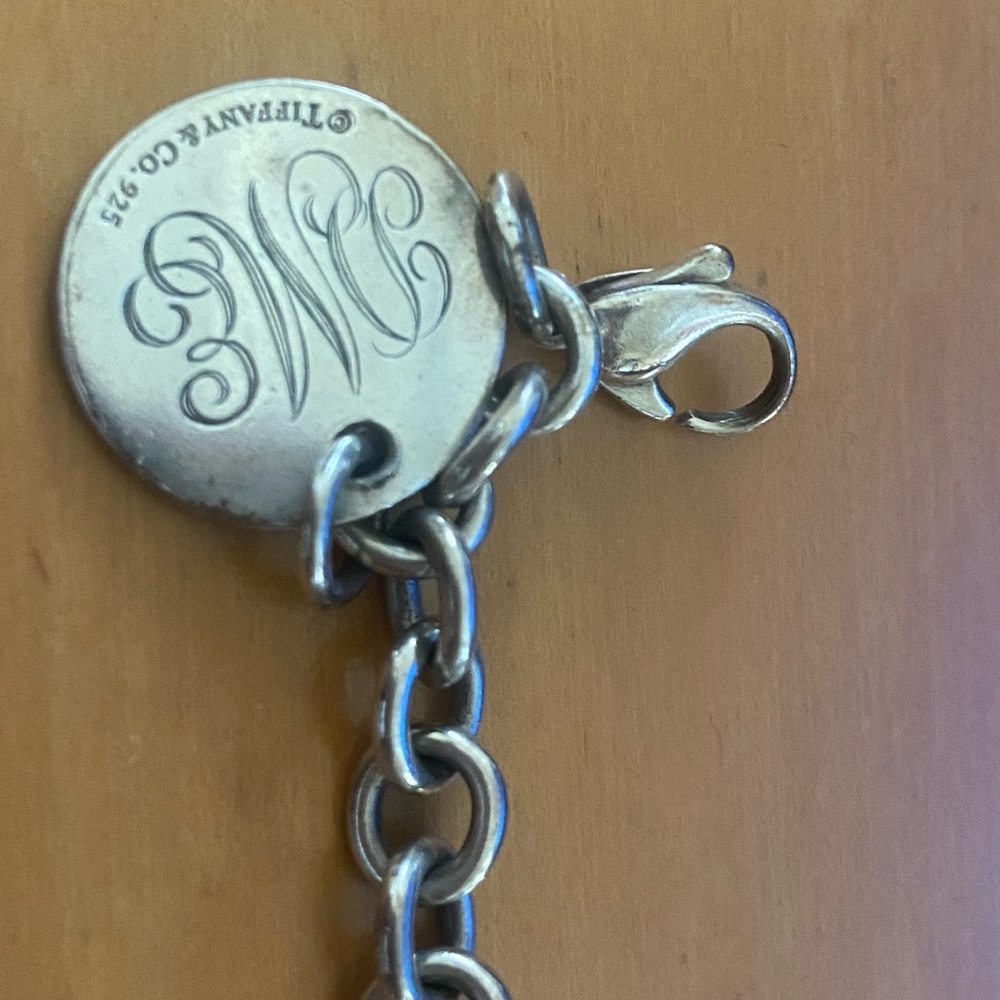 Tiffany & Co silver circle tag charm bracelet